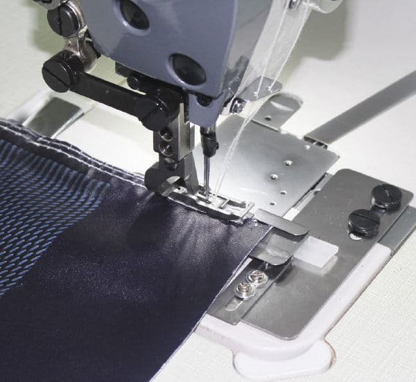 Máquina de coser perfil textil